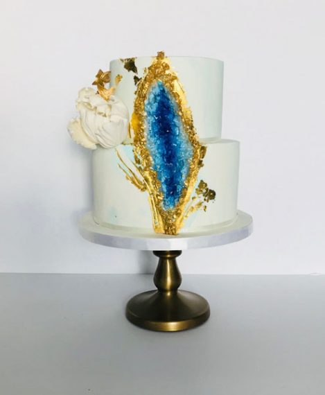 Geode inspired cake for a baptism. Decorated with gold leaf and sugar flowers